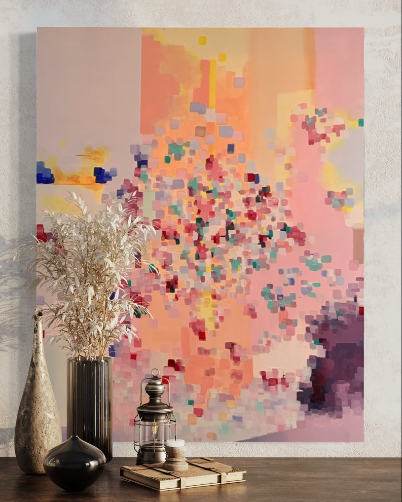 Painting displayed on an easel with a plant