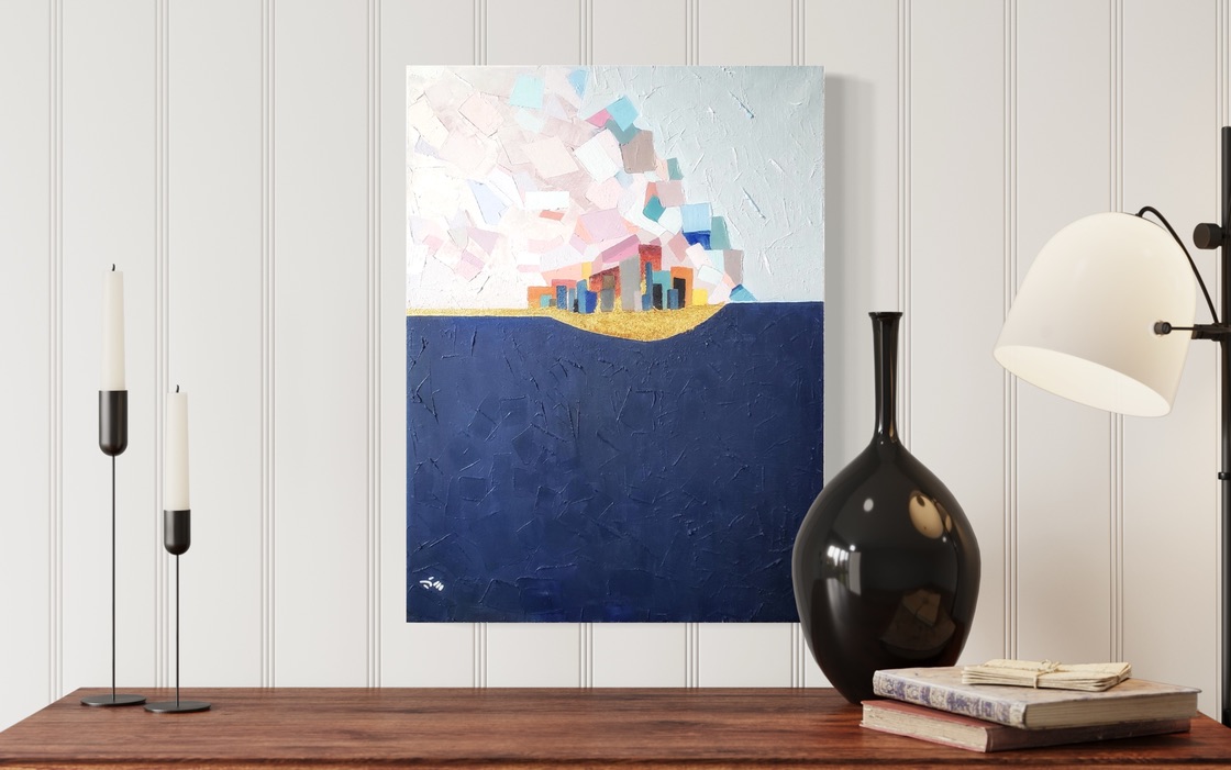 Painting displayed on a table with candlesticks